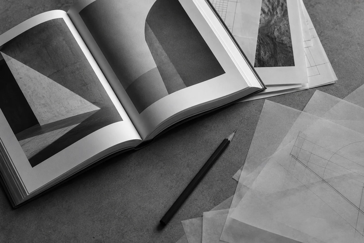A paper coursebook, tracing sheets and a pencil